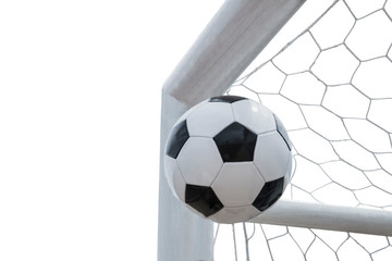 Foot ball soccer shoot in goal net isolated on white background this has clipping path.      
