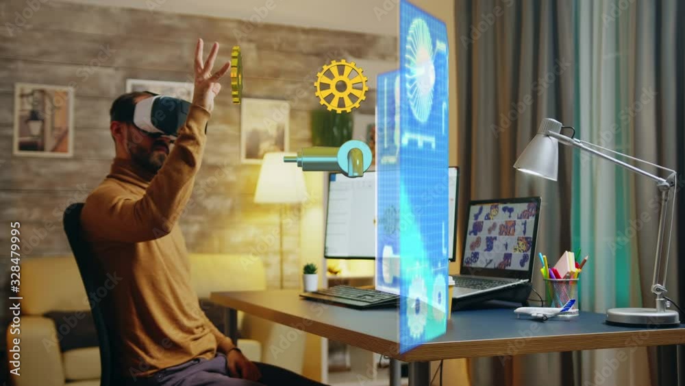 Poster engineer wearing a vr headset working in virtual space designing a new motor prototype on augmented 
