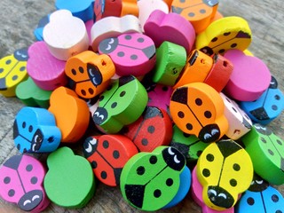 Naklejka premium Colorful wooden bead. Recycle wood for craft