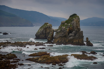 Fototapeta na wymiar Picturesque cliffs near the island of Gastelugache. Basque country. Northern spain