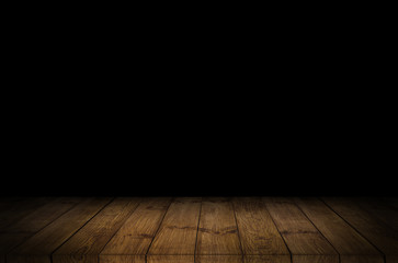 Old wood table top with smoke in the dark background.