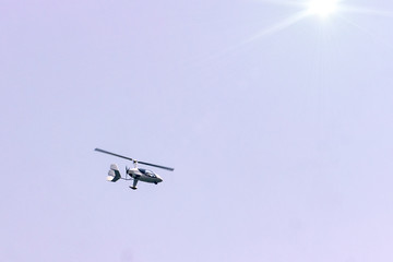 Ultralight plane flies over Pokhara and Annapurna region in Nepal. Copy space for advertising and design