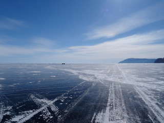 The traces of cars on the ice of lake Baikal