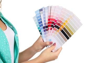 African-American woman with color palettes on white background