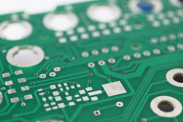 Multiplied printed circuit boards PCB isolated on the white background. PCB assembly. Close-up view