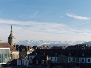 Naklejka premium View of Bern, an old Medieval city in Switzerland. Beautiful Alps in the background.