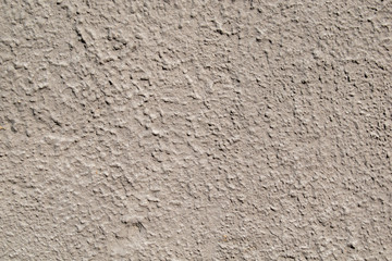 Background. Gray grunge textured wall. Stucco drops