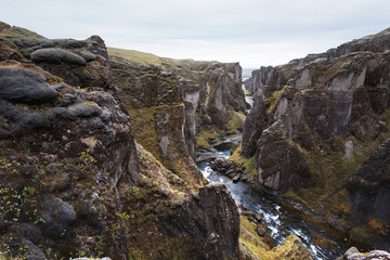 Fototapeta na wymiar Incredible landscape from famous Fjadrargljufur canyon in South east of Iceland, Europe