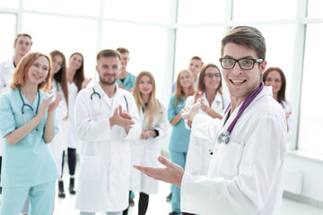 Fototapeta premium close up. happy group rejoices in their victory