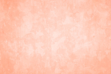 The orange background wall has space for text.