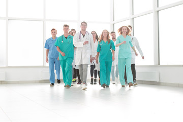 group of hilarious doctor interns standing together