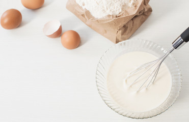 dough in glass plate and products for its preparation on  white