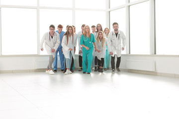 group of happy interns doctors standing together