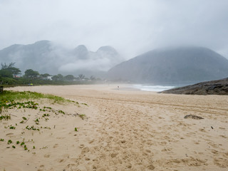 Cloudy day with fog, common during the winter at Itacoatiara beach, in the city of Niterói, state of Rio de Janeiro, Brazil.