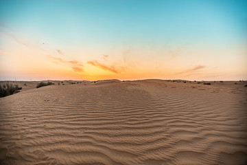 Fototapeta na wymiar sunset in the desert of Dubai, united arab emirates