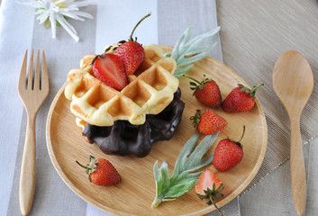 Waffles with Fresh Strawberries ready for Breakfast