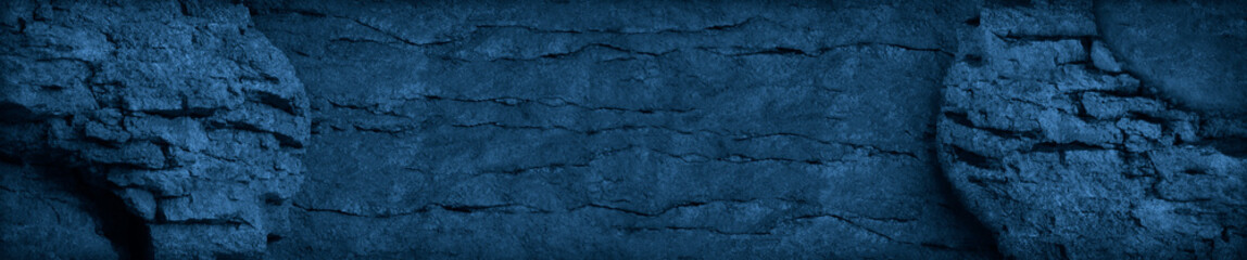 Blue stone background. Old cracked wall. Grunge banner. Vintage wall background with copy space. Website header.