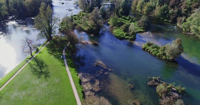 Aerial flying over beautiful Krka River near Otocec castle, a luxury hotel in Slovenia