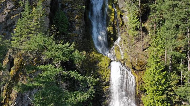 Slow approach to a beautiful northwest waterfall in the spring.  Filmed in 4K 60fps