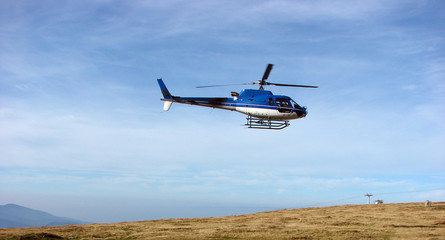 Fototapeta na wymiar Helicopter is ready to land