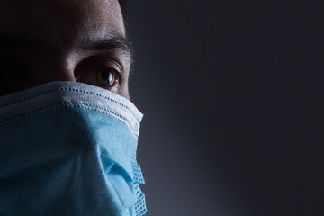 man in a protective mask, the H1N1 Virus