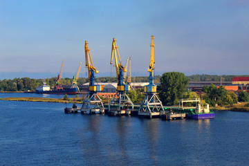 Industrial port with cranes and containers
