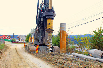 Machinery drilling on construction site