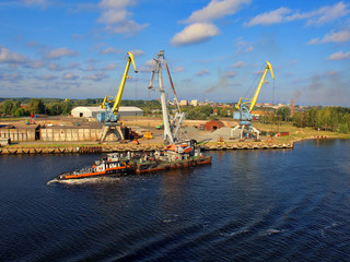 Small ship with big crane on sea