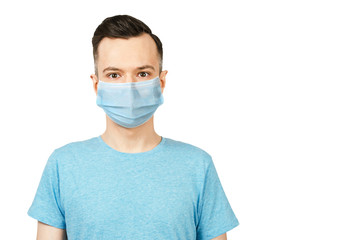 Unhappy, sad young man wearing a protective face mask prevent virus infection or pollution on white isolated background