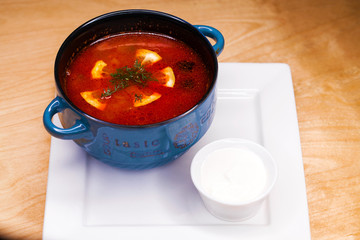 restaurant dish - soup solyanka in plate