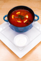 restaurant dish - soup solyanka in plate
