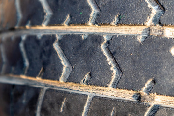 Detail of a old car tire background.