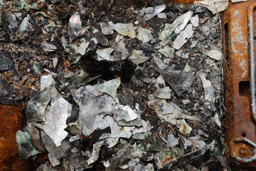 Charred remains of burned out car