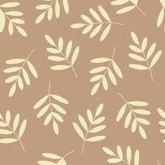 seamless pattern of cream-colored leaves with brown background.
