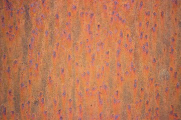 Fototapeta premium Brown rusted metal surface with dark spots