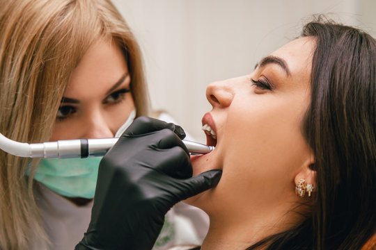 girl sitting at the dentist