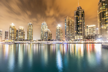 Dubai Marina skyline reflection at sunset