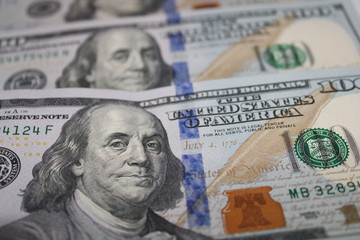 Obraz na płótnie Canvas american dollars background 100 dollars with Franklin
