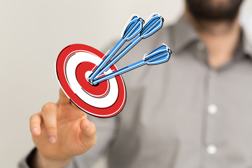 Dart arrow on target dartboard, Business success concept..