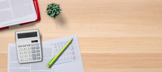 Top view of a wooden desk with copy space on the right