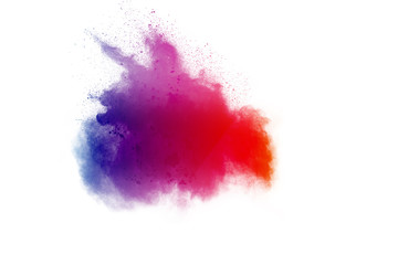 Colorful background of pastel powder explosion.Multi colored dust splash on white background.Painted Holi.