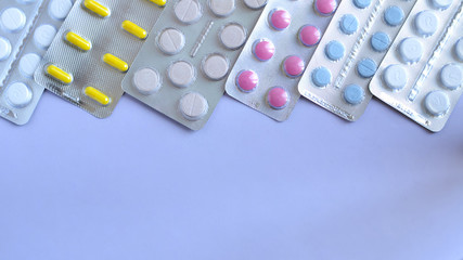 Pills in a row with copy space a top view