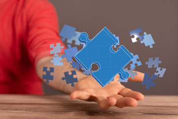 puzzle hand solution concept business.