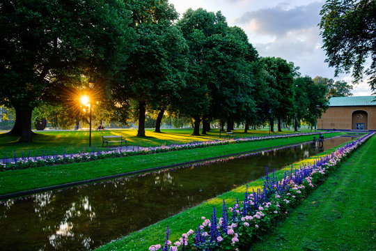 Sunlit canal in city park, Karlstad, V&auml;rmland, Sweden, Europe
