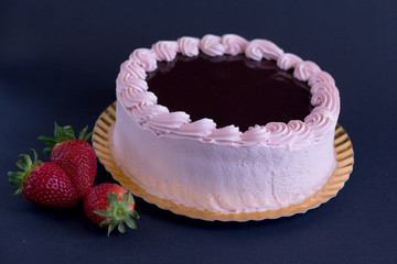 Strawberry and chocolate cake cover with fresh strawberry. Top view
