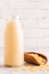 A bottle of rice milk and rice.