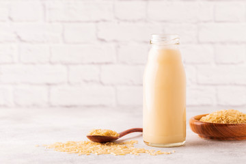 A bottle of rice milk and rice.