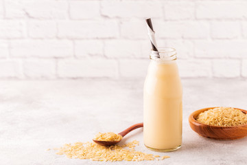 A bottle of rice milk and rice.