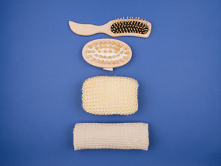 Personal hygiene items for the bathroom on a blue background.