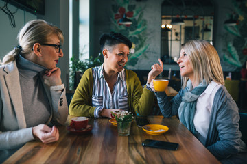 woman friends on coffee break at cafe